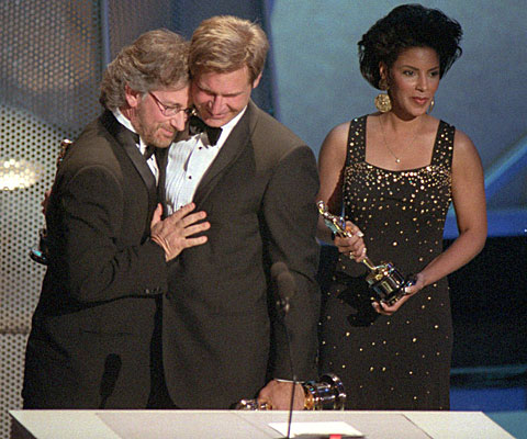 Steven Spielberg accepts the best picture Oscar from Harrison Ford for "Schindler's List."